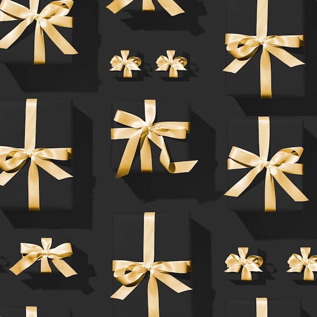 A watch resting in an open keepsake gift box