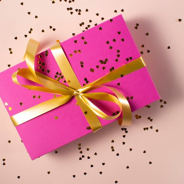 A gift box with a handwritten name tag